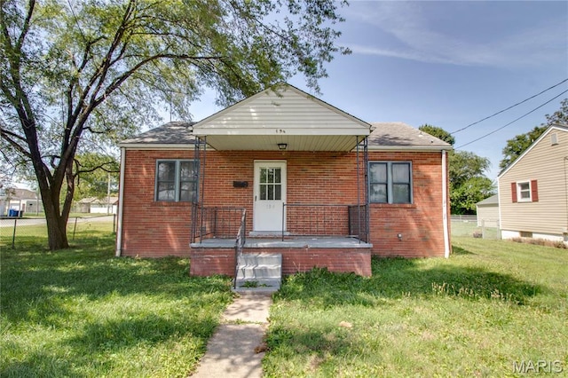 194 S Pence St, East Alton, IL 62024 - bungalow featuring brick siding