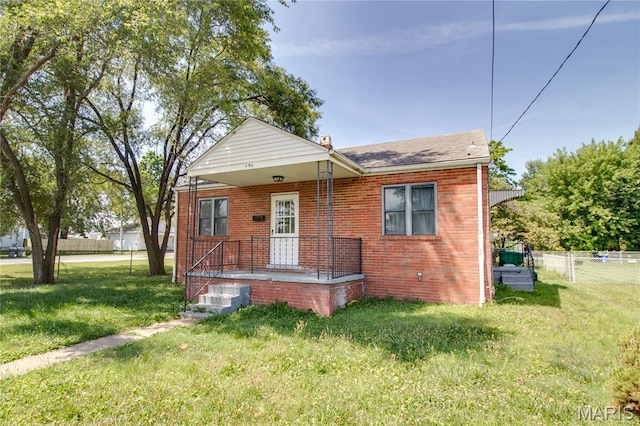 194 S Pence St, East Alton, IL 62024 - bungalow with brick siding and a shingled roof