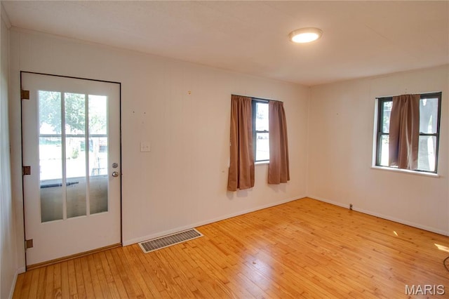194 S Pence St, East Alton, IL 62024 - spare room featuring hardwood / wood-style flooring and baseboards