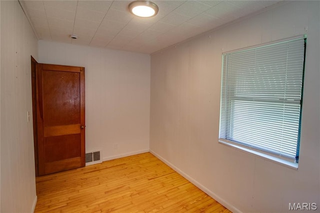 194 S Pence St, East Alton, IL 62024 - empty room featuring light wood finished floors