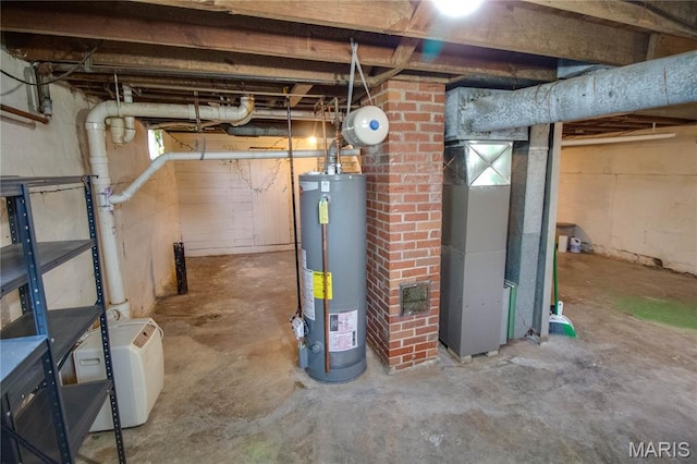 194 S Pence St, East Alton, IL 62024 - unfinished basement featuring water heater and heating unit