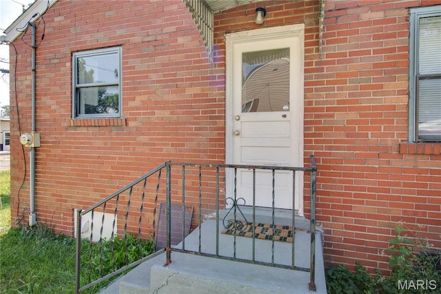 194 S Pence St, East Alton, IL 62024 - doorway to property with brick siding