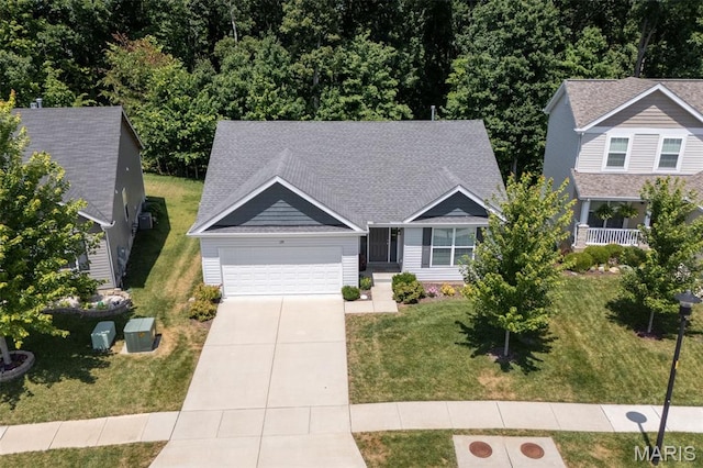 139 Brookview Way Dr, Ofallon, MO 63366 - view of front of property with driveway, an attached garage, a front lawn, and roof with shingles