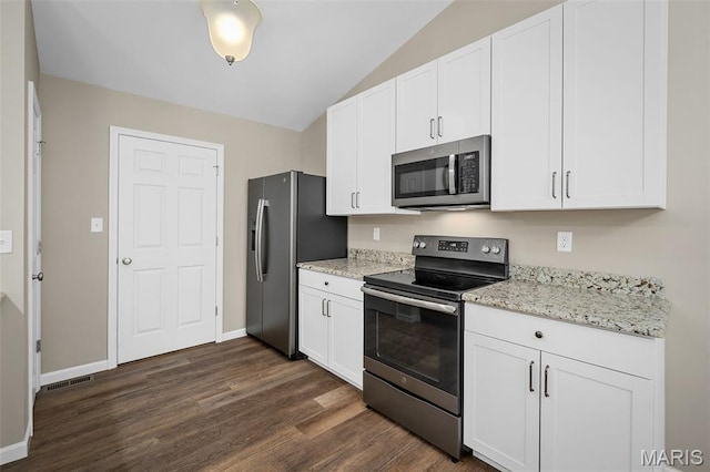 139 Brookview Way Dr, Ofallon, MO 63366 - kitchen with stainless steel appliances, dark wood-style floors, lofted ceiling, white cabinets, and light stone counters
