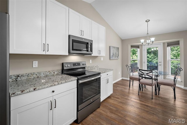 139 Brookview Way Dr, Ofallon, MO 63366 - kitchen featuring appliances with stainless steel finishes, vaulted ceiling, a chandelier, dark wood-style flooring, and white cabinetry