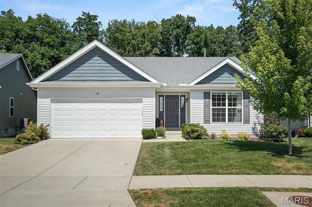 139 Brookview Way Dr, Ofallon, MO 63366 - ranch-style house with driveway, a front lawn, and a garage