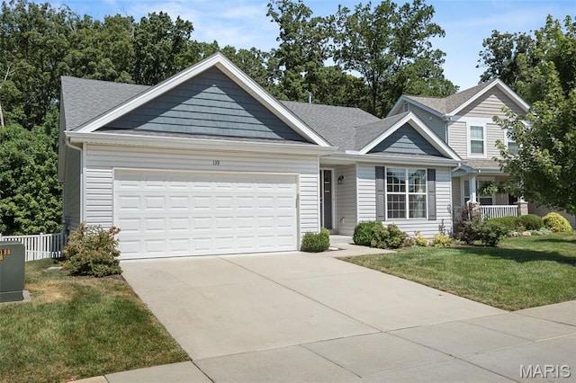 139 Brookview Way Dr, Ofallon, MO 63366 - view of front of property featuring concrete driveway, a garage, and roof with shingles
