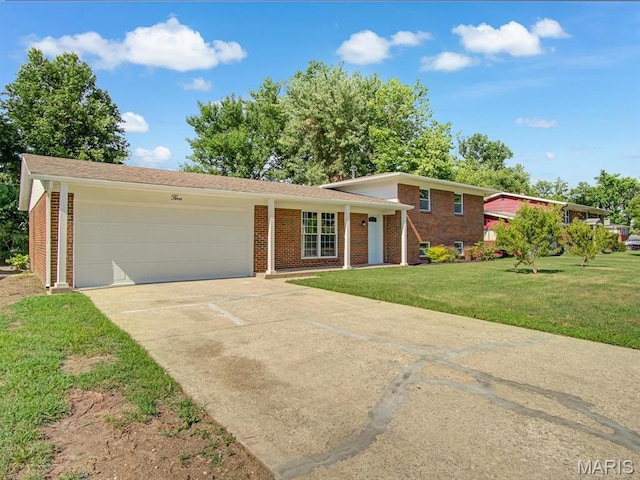5 Chalet Ct, Fairview Heights, IL 62208 - tri-level home featuring brick siding, concrete driveway, a garage, and a front lawn