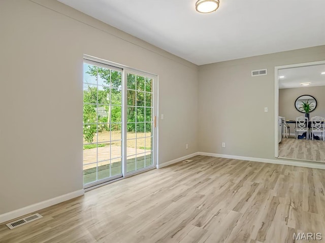 5 Chalet Ct, Fairview Heights, IL 62208 - spare room featuring light wood-type flooring and baseboards