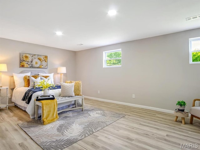 5 Chalet Ct, Fairview Heights, IL 62208 - bedroom featuring light wood-style flooring and recessed lighting