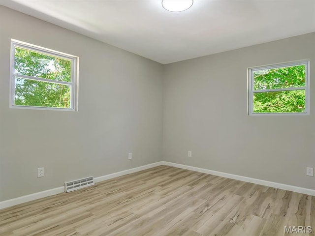 5 Chalet Ct, Fairview Heights, IL 62208 - unfurnished room with light wood-style floors and baseboards