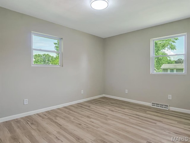5 Chalet Ct, Fairview Heights, IL 62208 - unfurnished room with light wood-type flooring