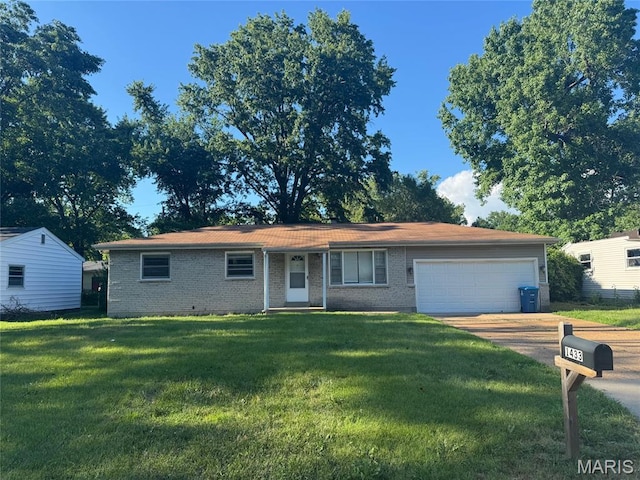 1433 Farmview Ave, Spanish Lake Township, MO 63138 - single story home with brick siding, a garage, a front yard, and concrete driveway