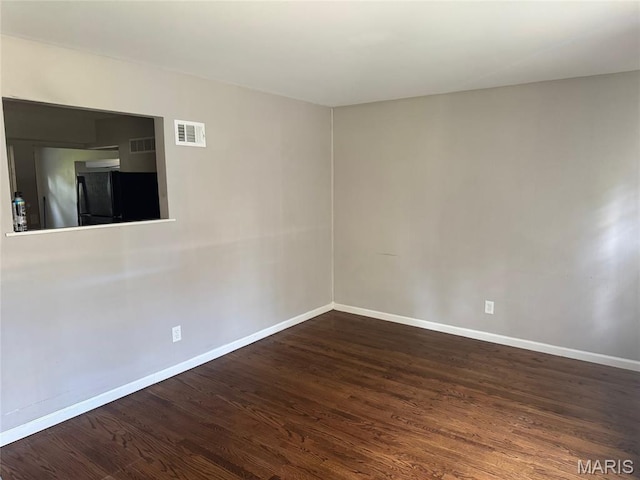1433 Farmview Ave, Spanish Lake Township, MO 63138 - unfurnished room featuring baseboards and wood finished floors