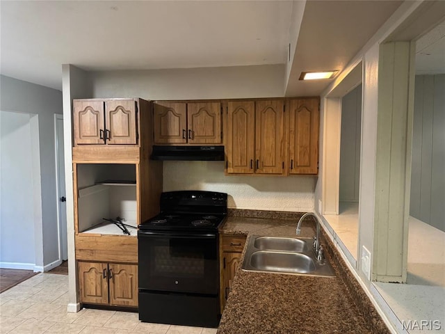 1433 Farmview Ave, Spanish Lake Township, MO 63138 - kitchen featuring black electric range, under cabinet range hood, dark countertops, and brown cabinets