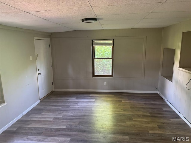 1433 Farmview Ave, Spanish Lake Township, MO 63138 - unfurnished room featuring wood finished floors and a paneled ceiling