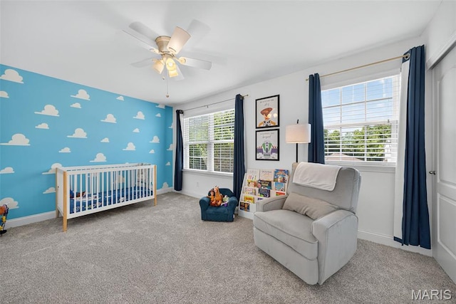 231 Flint Brook Dr, Ofallon, MO 63366 - carpeted bedroom with a ceiling fan and a crib