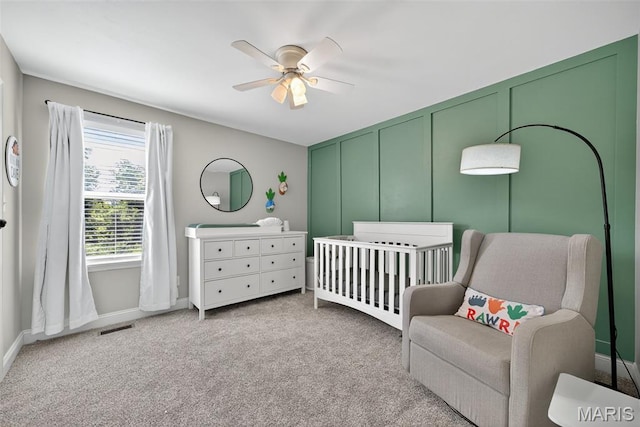 231 Flint Brook Dr, Ofallon, MO 63366 - bedroom featuring a crib, carpet flooring, and ceiling fan