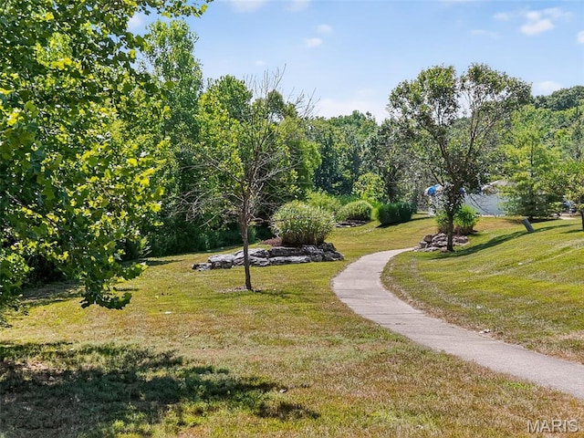 231 Flint Brook Dr, Ofallon, MO 63366 - surrounding community with a yard