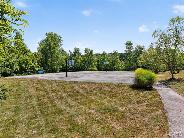 231 Flint Brook Dr, Ofallon, MO 63366 - view of basketball court with community basketball court and a lawn
