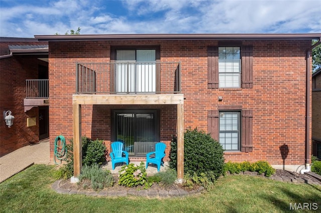 5593 Baronridge Dr Unit 7, Saint Louis, MO 63129 - rear view of house featuring a balcony and brick siding