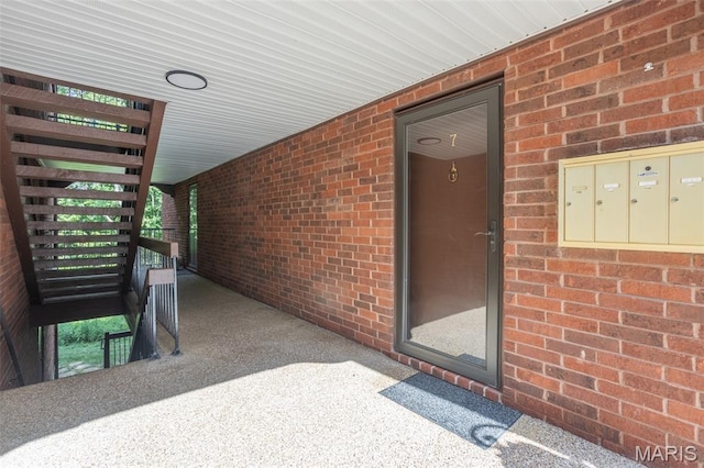 5593 Baronridge Dr Unit 7, Saint Louis, MO 63129 - doorway to property featuring brick siding