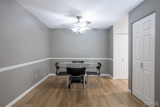 5593 Baronridge Dr Unit 7, Saint Louis, MO 63129 - dining room with wood finished floors and a ceiling fan