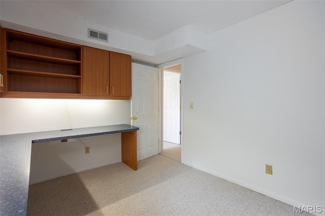 5593 Baronridge Dr Unit 7, Saint Louis, MO 63129 - unfurnished office with built in desk and light colored carpet