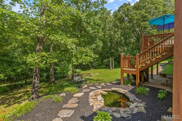 5090 Green Hills Rd, Festus, MO 63028 - view of grassy yard featuring stairs, a deck, and a fire pit