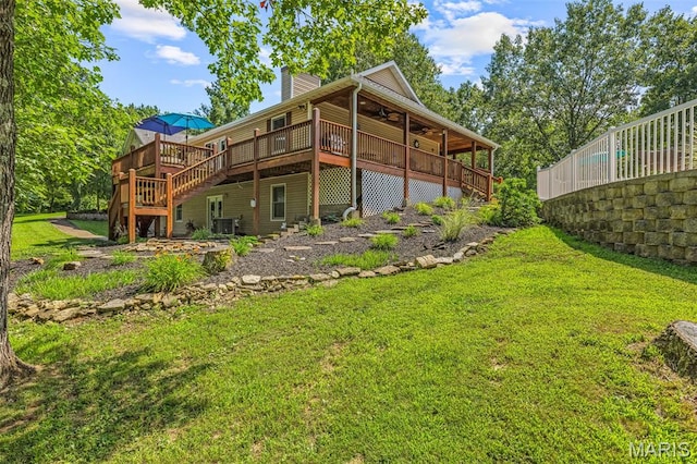 5090 Green Hills Rd, Festus, MO 63028 - back of property featuring ceiling fan, a deck, a yard, a chimney, and stairway