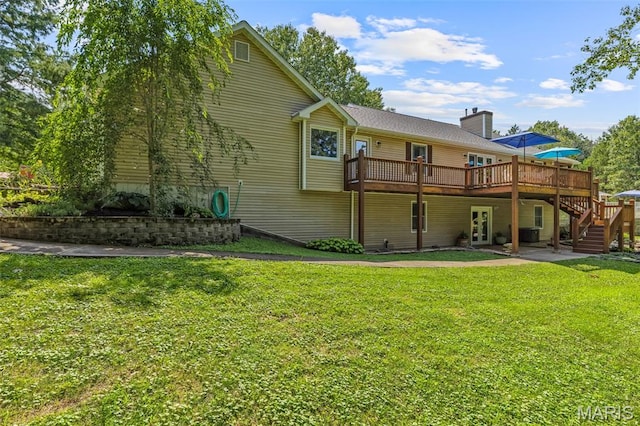 5090 Green Hills Rd, Festus, MO 63028 - back of house featuring a wooden deck, a chimney, stairway, and a lawn