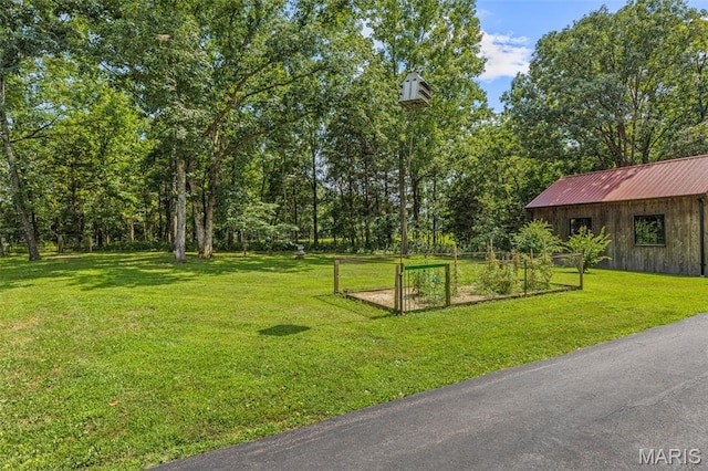 5090 Green Hills Rd, Festus, MO 63028 - view of green lawn with a garden