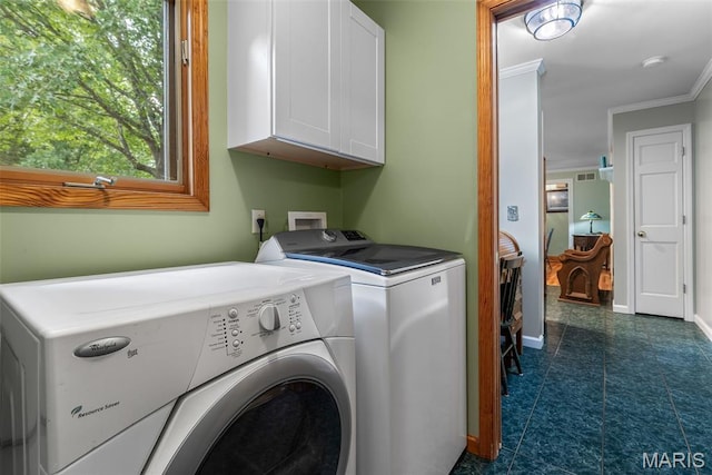 5090 Green Hills Rd, Festus, MO 63028 - laundry room with cabinet space, separate washer and dryer, crown molding, and dark tile patterned flooring