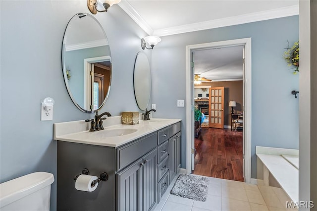 5090 Green Hills Rd, Festus, MO 63028 - full bath featuring double vanity, crown molding, tile patterned floors, a bath, and ceiling fan