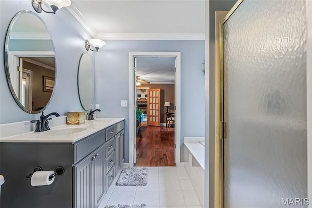5090 Green Hills Rd, Festus, MO 63028 - full bath with a ceiling fan, ornamental molding, tile patterned flooring, double vanity, and a bath