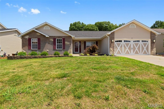 21 September St, Moscow Mills, MO 63362 - ranch-style house featuring an attached garage, brick siding, driveway, and a front lawn