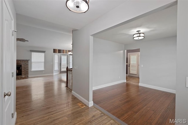 21 September St, Moscow Mills, MO 63362 - hallway with wood finished floors and a chandelier