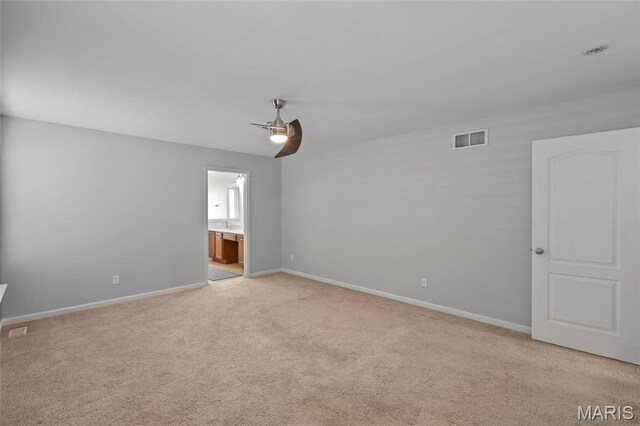 21 September St, Moscow Mills, MO 63362 - unfurnished room with a ceiling fan and light carpet