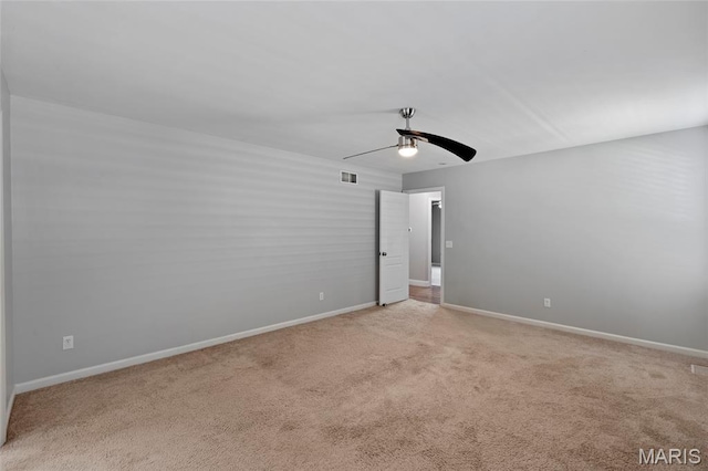 21 September St, Moscow Mills, MO 63362 - empty room featuring ceiling fan and light carpet