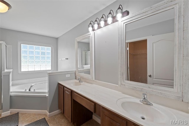 21 September St, Moscow Mills, MO 63362 - bathroom with a bath, double vanity, and tile patterned flooring