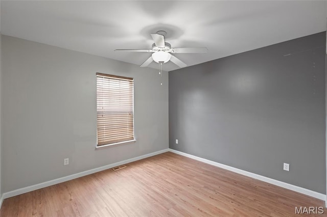 21 September St, Moscow Mills, MO 63362 - empty room featuring ceiling fan and light wood-style flooring