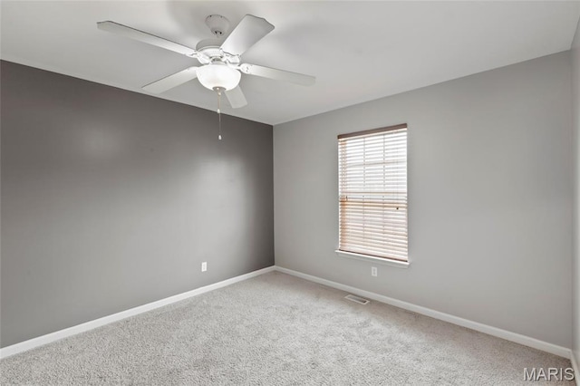 21 September St, Moscow Mills, MO 63362 - carpeted empty room with baseboards and a ceiling fan