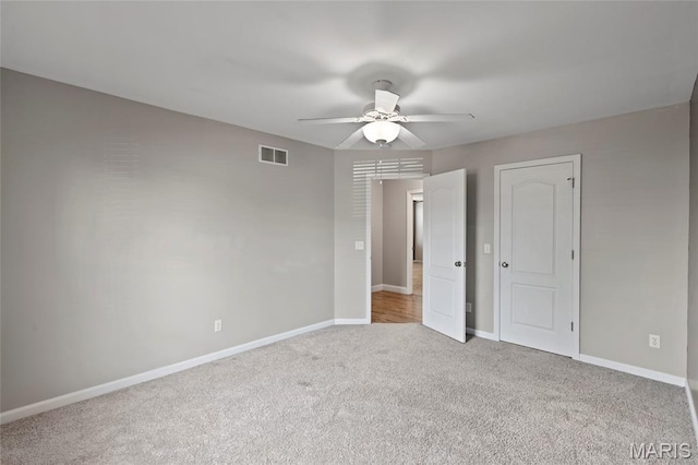 21 September St, Moscow Mills, MO 63362 - unfurnished bedroom featuring carpet and a ceiling fan