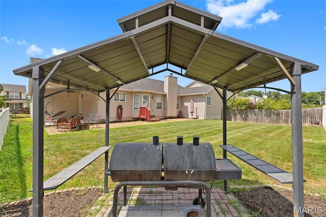 21 September St, Moscow Mills, MO 63362 - surrounding community featuring a fire pit and a carport