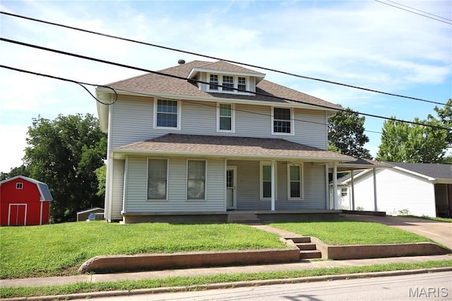 616 Greensferry Rd, Jackson, MO 63755 - traditional style home with a porch, an attached carport, a front yard, driveway, and an outbuilding