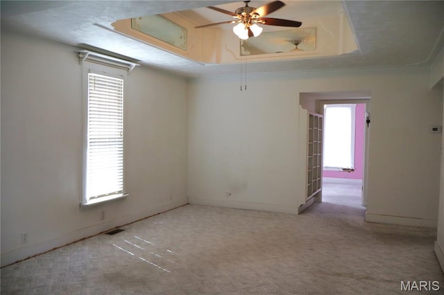616 Greensferry Rd, Jackson, MO 63755 - empty room with a tray ceiling, a ceiling fan, and carpet flooring