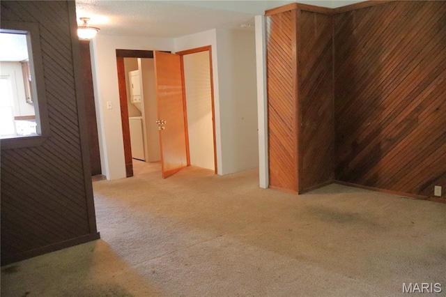 616 Greensferry Rd, Jackson, MO 63755 - unfurnished bedroom with stacked washer and clothes dryer and carpet flooring