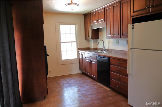 616 Greensferry Rd, Jackson, MO 63755 - kitchen featuring freestanding refrigerator, black dishwasher, and a textured ceiling