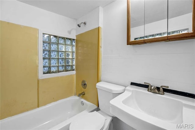 5316 Janet Ave, Jennings, MO 63136 - full bathroom featuring toilet and washtub / shower combination
