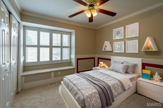 1715 Foxglove Dr, Saint Charles, MO 63303 - bedroom with light carpet, ornamental molding, a ceiling fan, and a wainscoted wall
